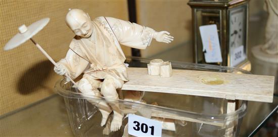 A Japanese sectional ivory okimono, Meiji period, length 19cm, glue repairs
